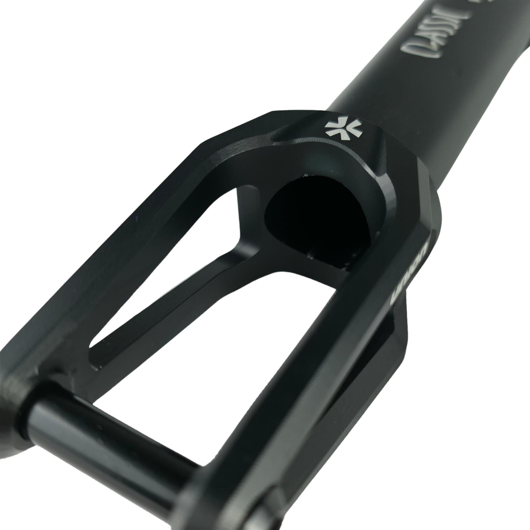 Close-up of the Union Classic Lightweight HIC/SCS Stunt Scooter Fork in black, featuring angular cutouts and a small white Union logo near the top, shown on a white background.
