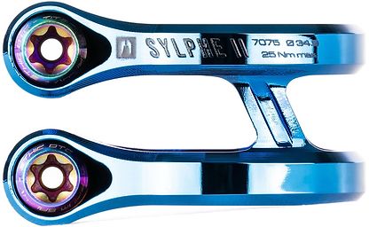 Close-up of the Ethic DTC Sylphe V2 2 Bolt Oversized Stunt Scooter Clamp in Chrome Blue by Ethic, featuring “SYLPHE N,” “7075 034,” and “26Nm max” engravings, two iridescent bolts, and a sleek machined design.