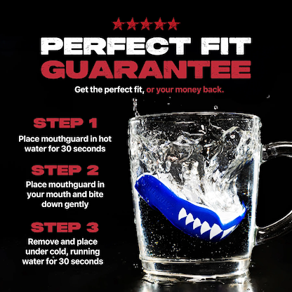 The Safejawz Extro Series Protection Mouthguard - Shark, featuring blue design with white fangs, is shown making a splash in a glass mug. Three fitting steps are listed beside the image. Bold text reads "Perfect Fit Guarantee" and promises hi-impact protection.