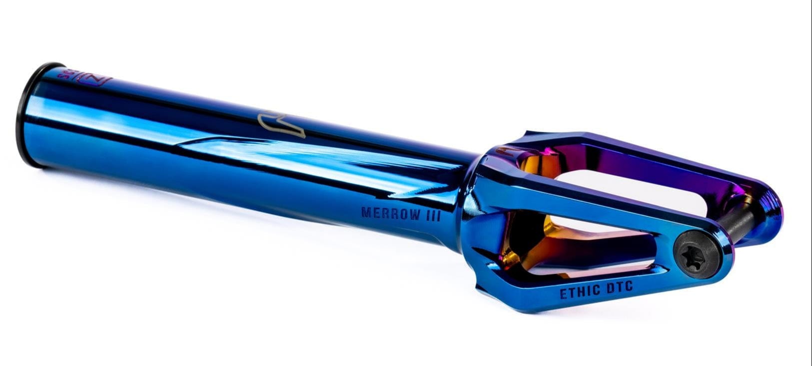 The Ethic DTC Merrow V3 SCS Stunt Scooter Fork in chrome blue by Ethic, made from 7075 aluminium and among the lightest forks available, is shown with “MERROW III” and “ETHIC DTC” labeling on a white background.