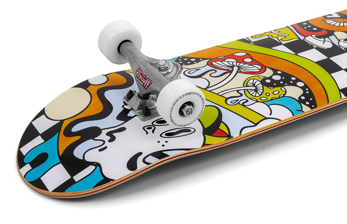 The Enuff Meltworld Confused Complete Skateboard (7.75" x 31.5") features a vibrant deck design with a cartoon face, mushrooms, rainbow, and black-and-white checkered patterns.
