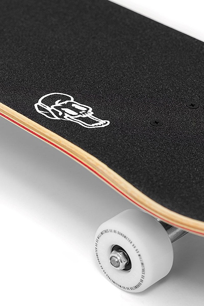 Close-up of an Enuff Abyss Jellyfish Complete Skateboard (8.0" x 32.0") showing black grip tape, wooden maple edges, and a white wheel attached to a metal truck. Brand: Enuff.