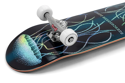 A close-up of the Enuff Abyss Jellyfish Complete Skateboard - 8.0" x 32.0", featuring a vibrant jellyfish graphic on a dark maple deck, with white wheels and silver trucks by Enuff.