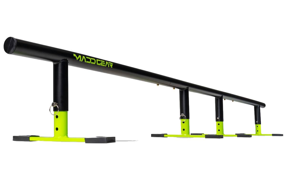 The Madd Gear MGP Ninety9 Grind Rail - 251cm, in black and neon yellow with four legs, is sturdy and ideal for skateboarding, scooters, or BMX tricks—perfect for practicing all your favorite moves.