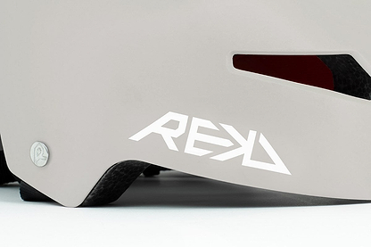 Close-up of the REKD Elite 2.0 Skate / Scooter Helmet in Grey / Yellow, featuring a lightweight design, black vent, bold white "REKD" logo, and quality metal screw detail—showcasing the craftsmanship of this certified REKD helmet.