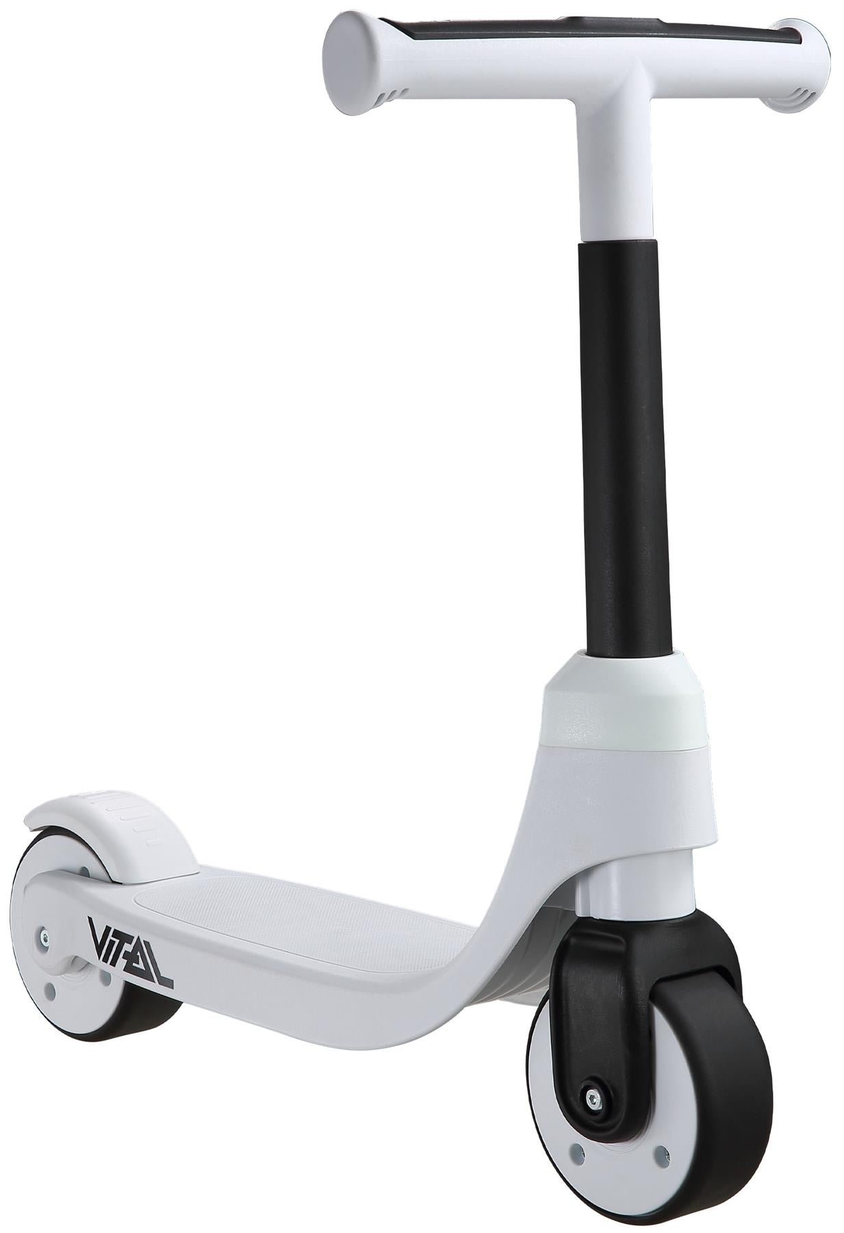 The Vital First Kids Scooter - White / Black features a wide foot deck, two small front wheels, one rear wheel, and a T-shaped handlebar. The brand name "Vital" appears near the back wheel.