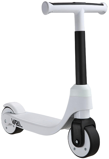 The Vital First Kids Scooter - White / Black features a wide foot deck, two small front wheels, one rear wheel, and a T-shaped handlebar. The brand name "Vital" appears near the back wheel.