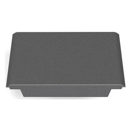 A rectangular, dark gray metal object with a flat top and curved edges, resembling the CORE Mini Funbox Ramp Set by CORE, is viewed from above against a white background.