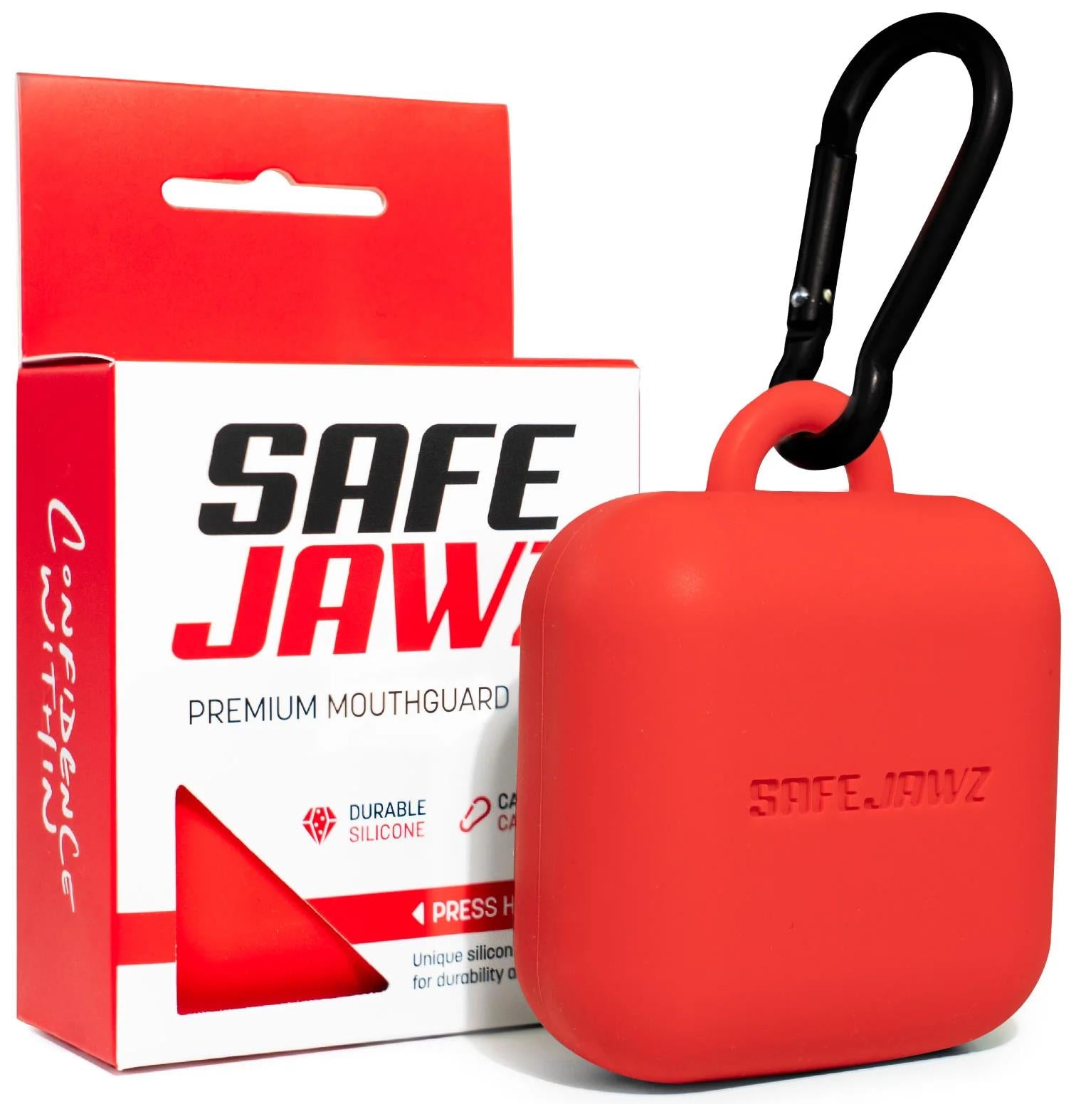 A Safejawz Premium Silicone Mouthguard Case in red, featuring a black carabiner, is displayed before its packaging, which highlights the Safejawz brand and the phrases “premium silicone mouthguard case” and “durable silicone.”.