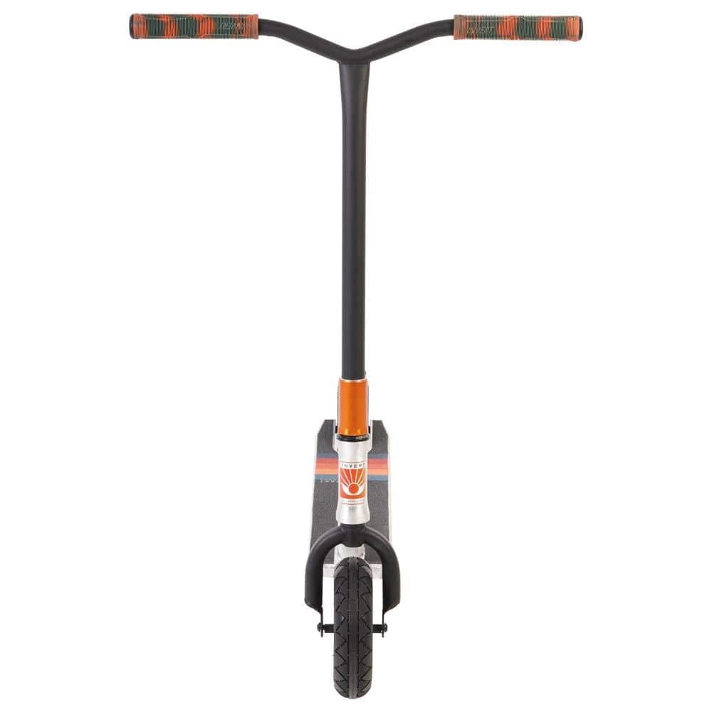 Front view of the Invert Supreme Taunt Dirt Scooter in a sleek raw, orange, and green color scheme, featuring striped handlebars and a sturdy single front wheel. The deck displays a graphic design with a textured surface and is enhanced by an integrated headset for smooth rides.