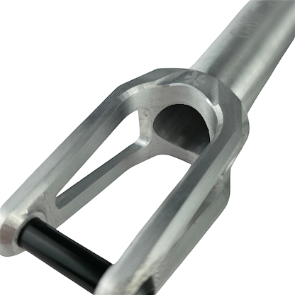 A close-up of the Union Classic Lightweight HIC/SCS Stunt Scooter Fork in polished aluminum highlights its sleek design and sturdy build, making it ideal for high-performance stunt riders.