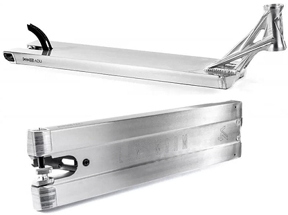 The sleek Ethic DTC Lindworm V4 Raw Silver Stunt Scooter Deck in a close-up highlights its lightweight design. This 5.9" x 21.25" deck boasts a brushed metal finish with intricate cutout details at the rear, while the Ethic brand name and logo are subtly embossed on the side.