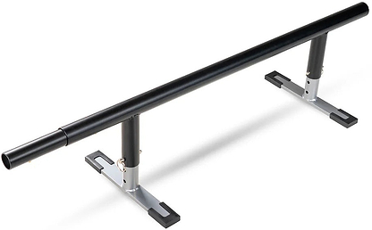 A black metal Madd Gear skate rail with adjustable height and sturdy silver-and-black base legs for skate or inline tricks. Compatible with the Madd Gear MGP Grind Rail Extension Kit - 91cm for added length and challenge.