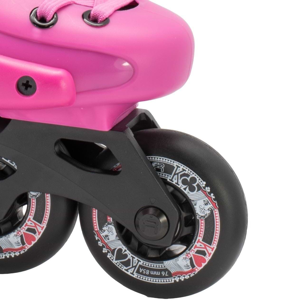 Close-up of the FR Skates Junior Adjustable Inline Skates - Pink, showcasing extruded aluminum X-Series frames and black wheels. The decorative white and red patterns feature card suits like hearts and spades. The pink boot, ideal for freeriders, is partially visible with pink laces.