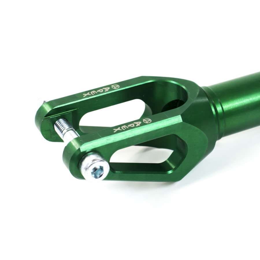 Close-up of an Apex Quantum SCS/HIC Stunt Scooter Fork, showcasing the green anodized finish with two prongs, a bolt, and hexagonal cutouts. This durable fork upgrade is embellished with Apex brand markings on its surface.