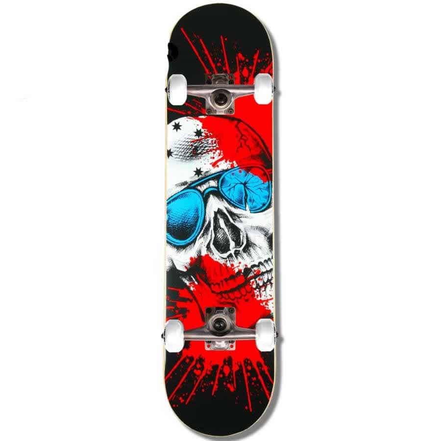 The Madd Gear MGP Gangsta Series Acci Complete Skateboard, measuring 7.75" x 31", features a durable 7-ply maple deck adorned with a bold graphic of a white skull in blue sunglasses against a dynamic red and black splattered background, making it an excellent choice for beginner skateboarders looking for style and durability.