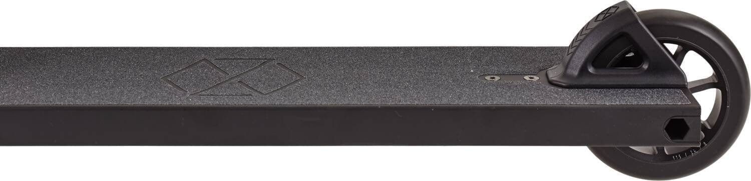 Close-up side view of the Native Stem 495mm S Complete Stunt Scooter by Native in black, featuring a textured deck, geometric logo, and a single rear wheel secured with a black plastic fender.