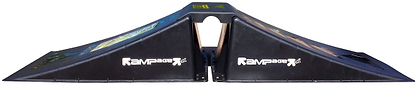 The Rampage Airbox V2 Full Size Ramp by Rampage is a black plastic skate ramp set featuring two opposing sloped ramps joined by a central flat bridge.