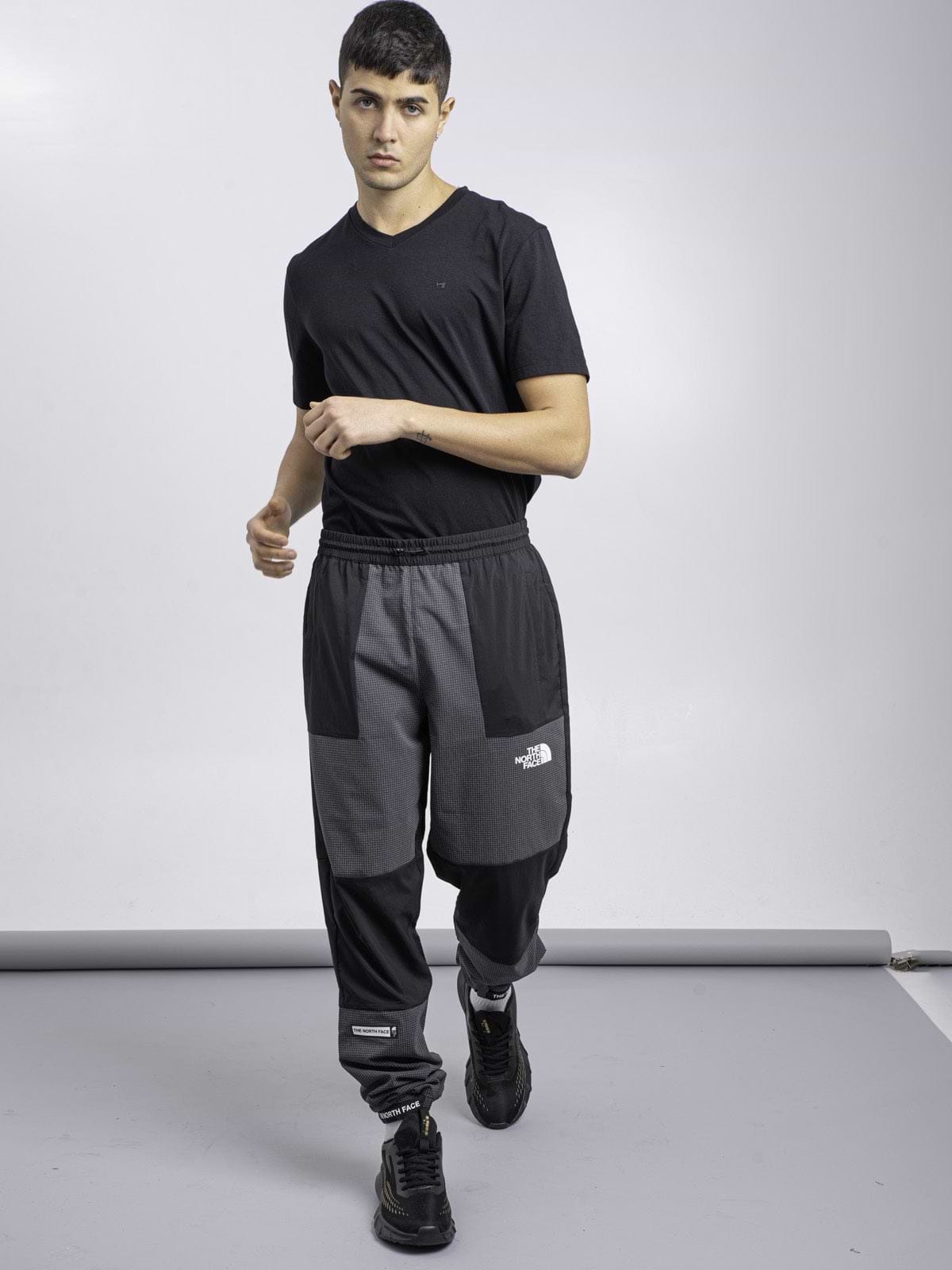 מכנסי ניילון ספורטיביים שילוב הדפס משבצות- THE NORTH FACE|דה נורת' פייס