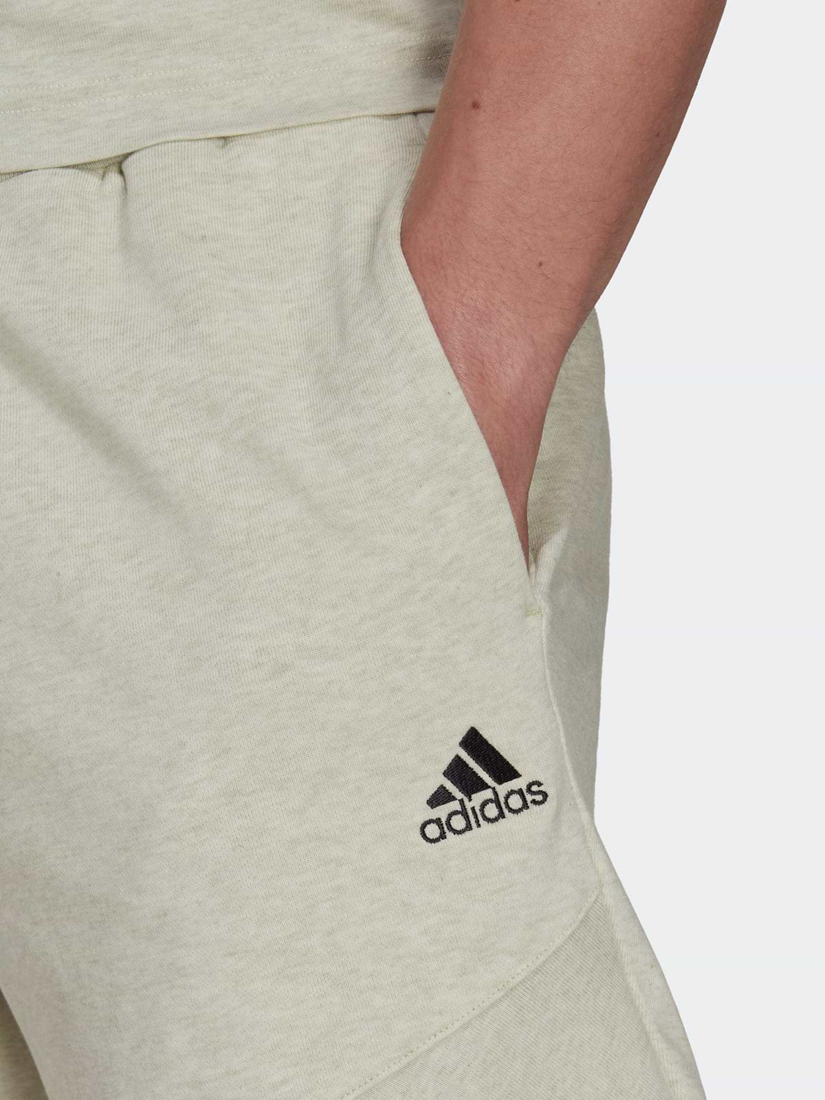 מכנסיים ספורטיביים עם לוגו מודפס