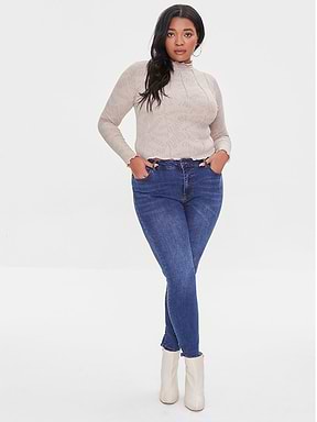 מכנסי ג'ינס בגזרה גבוהה ובמידות גדולות