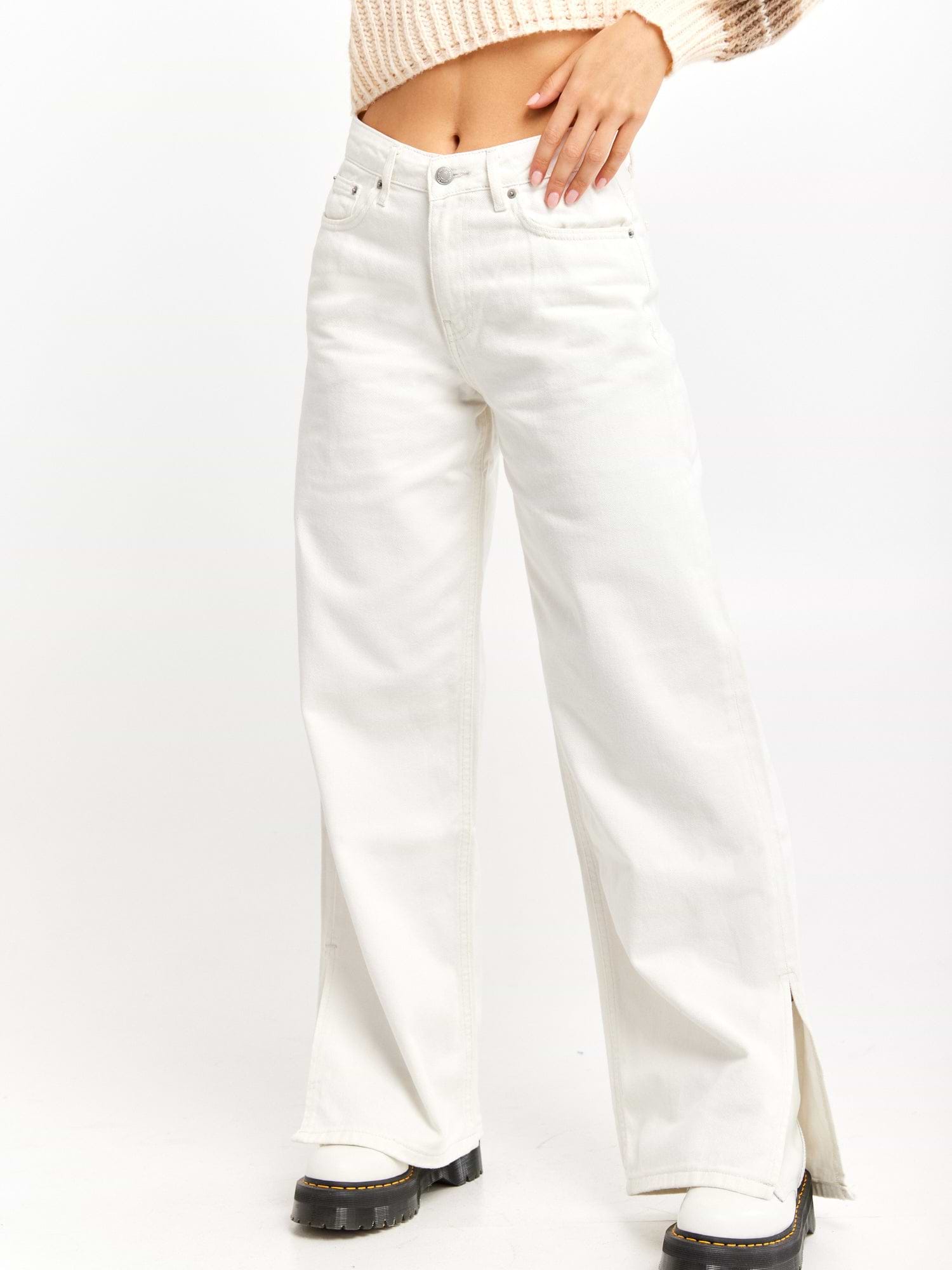 מכנסי ג'ינס בגזרה גבוהה עם שליץ