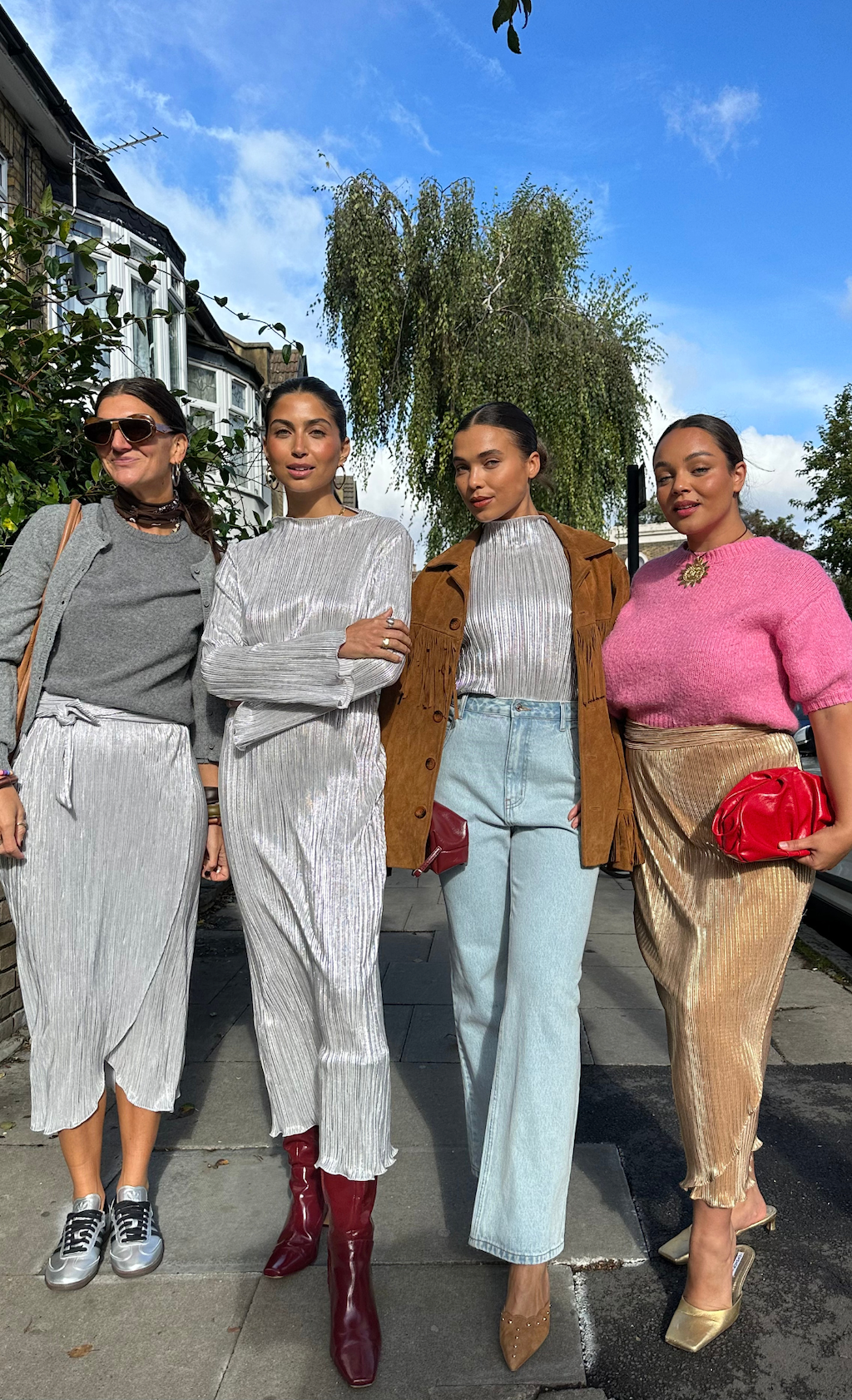 Lucy with three models wearing different versions of our plisse fabric