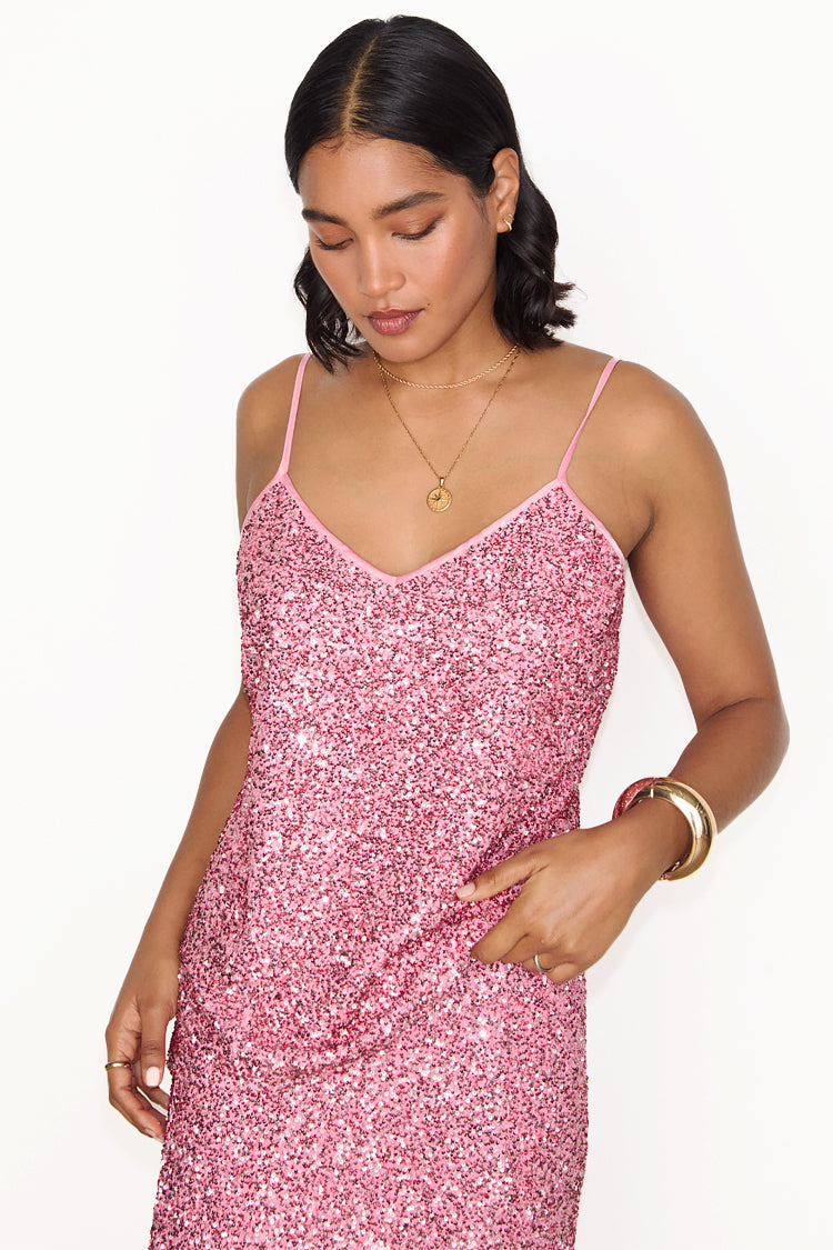 caption_Model wears Pink Sequin Cami Top in UK size 10/ US 6