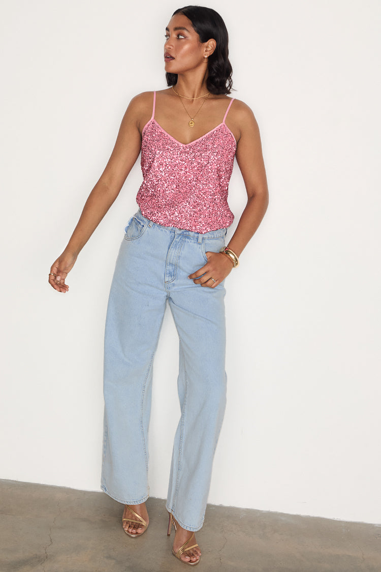 caption_Model wears Pink Sequin Cami Top in UK size 10/ US 6