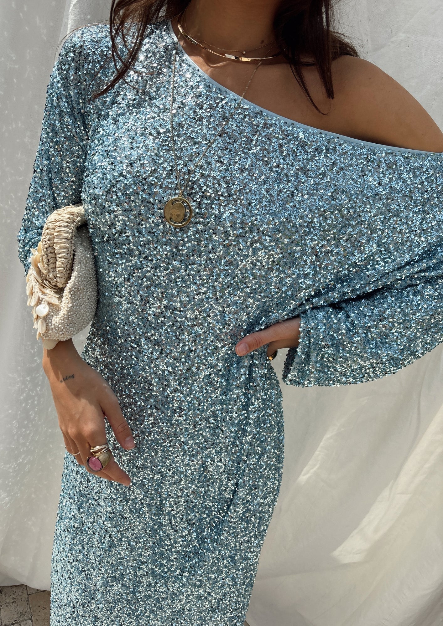 caption_Model wears Ice Blue Sequin Jem Dress in UK size 10/ US 6