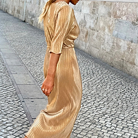 Thumbnail for Model wearing gold plisse dress