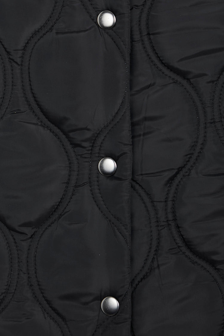 cut out of Black Quilted Skirt