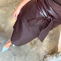 Thumbnail for Model wearing Chocolate Vegan Leather Jaspre Skirt close up