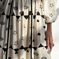 Thumbnail for Model wearing Mono Palm Jasmine Dress standing facing the camera 