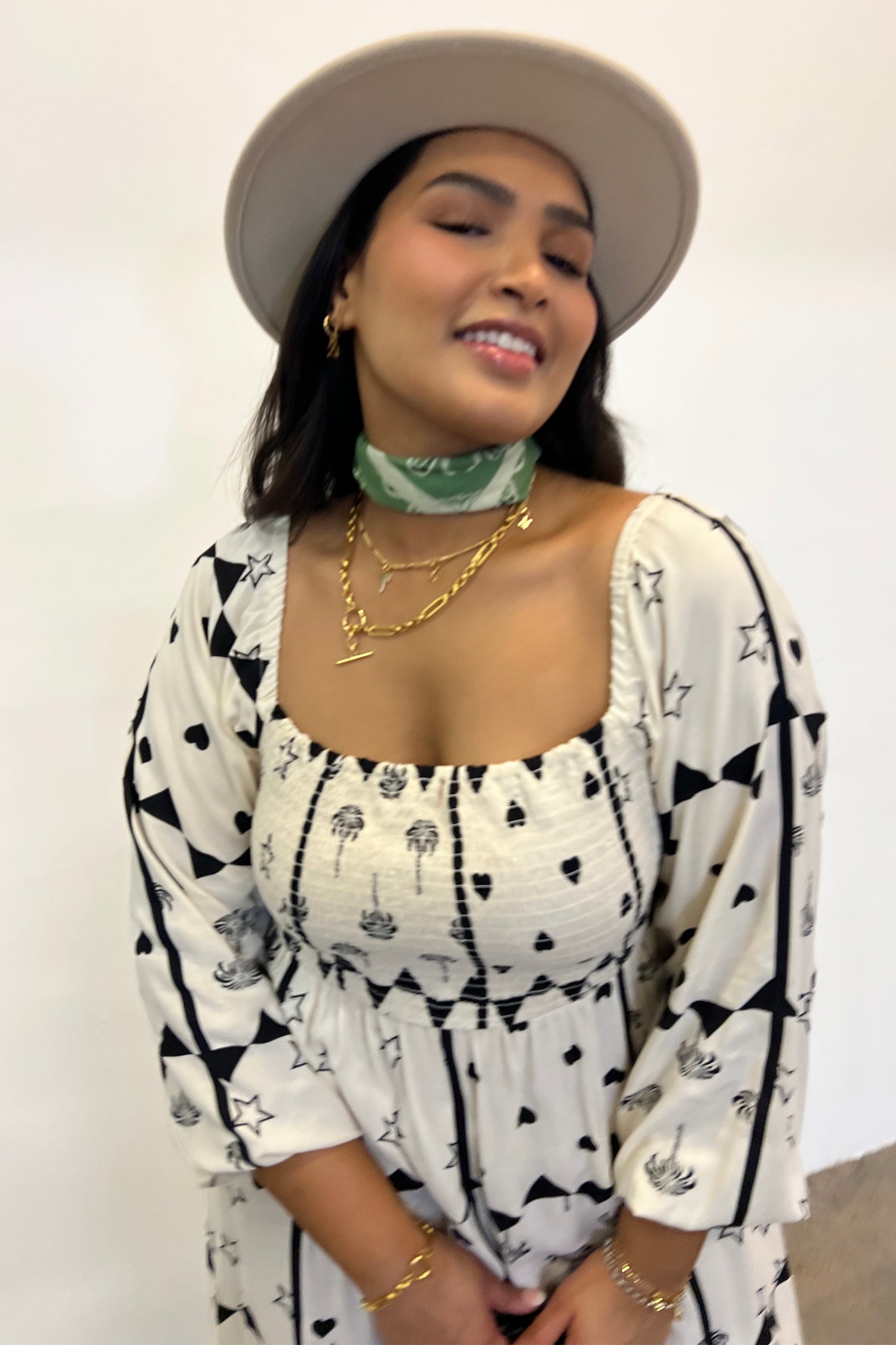 Model wearing Mono Palm Jasmine Dress standing facing the camera 