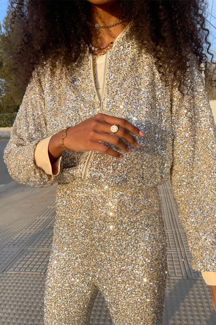 Model wearing Sequin Flared Trousers 