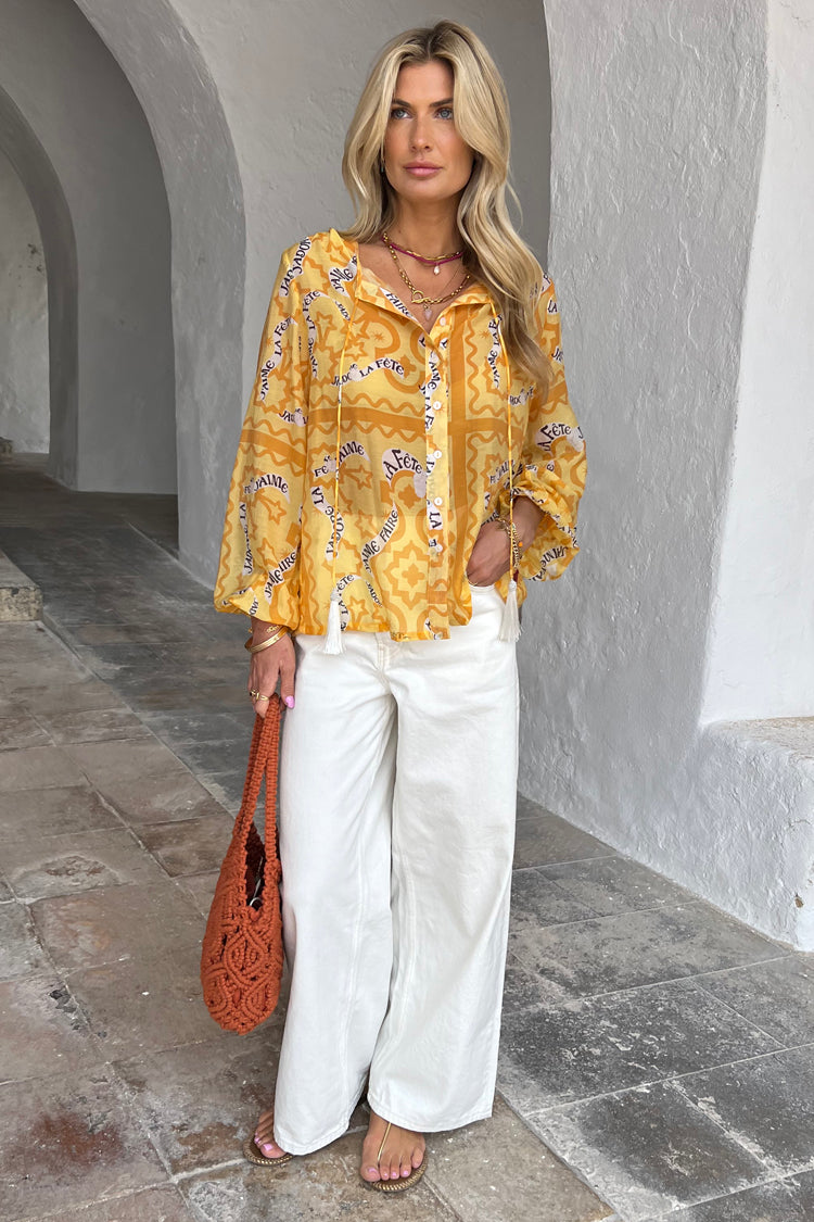 Model wearing Yellow J'adore Shirt