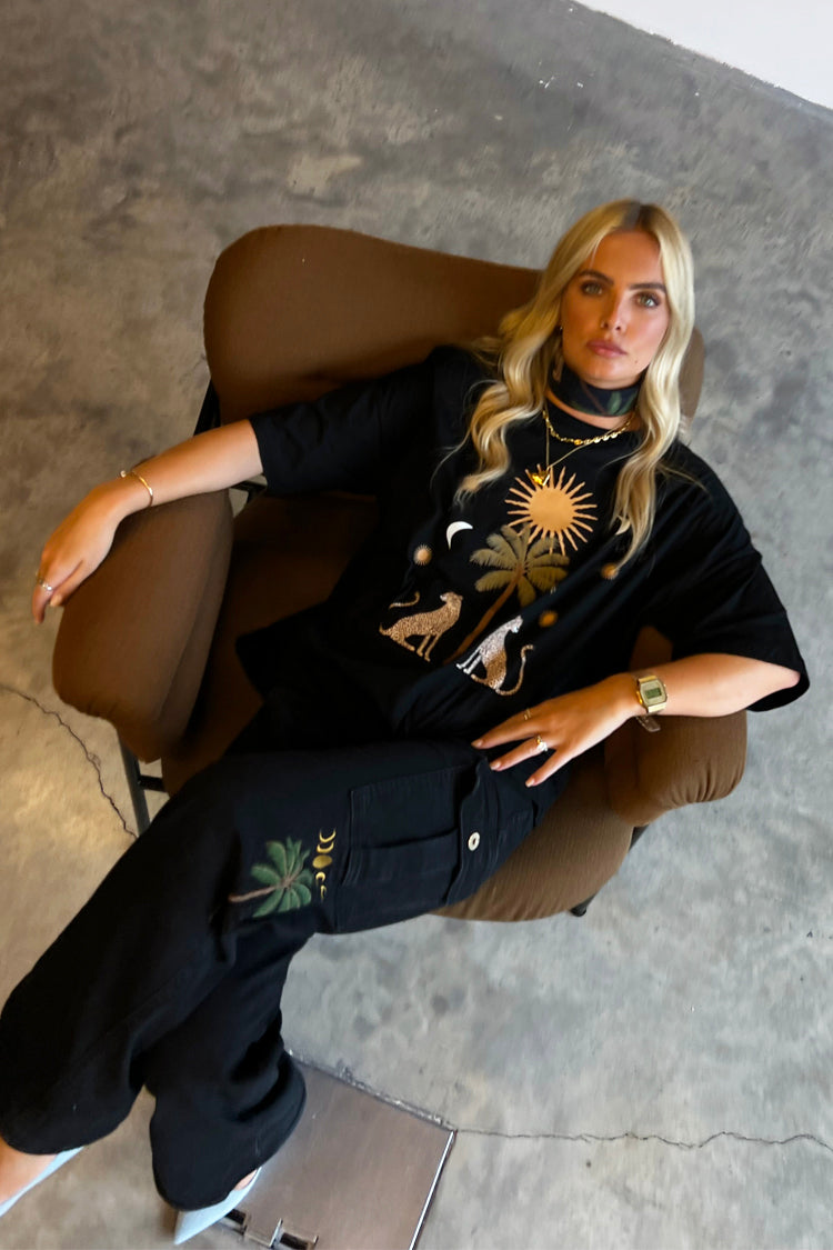 Model wearing Running Wild Cargo Jean