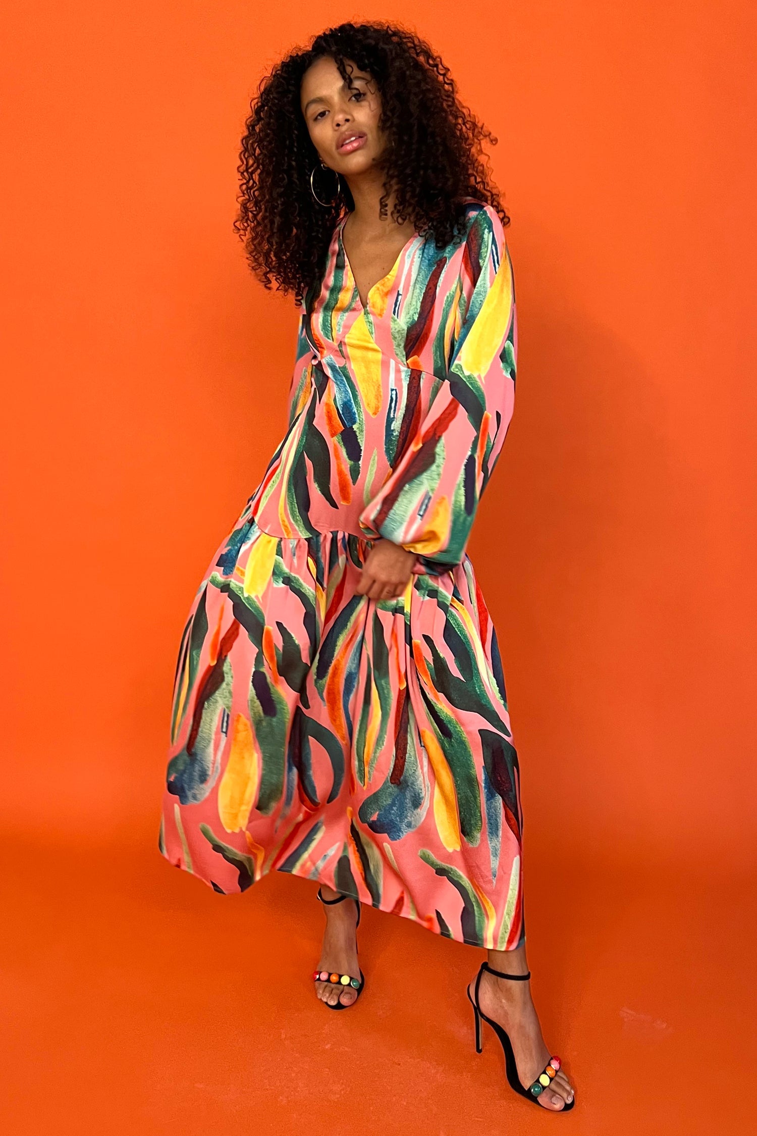 Model wearing Tropical Sophie Dress standing facing the camera