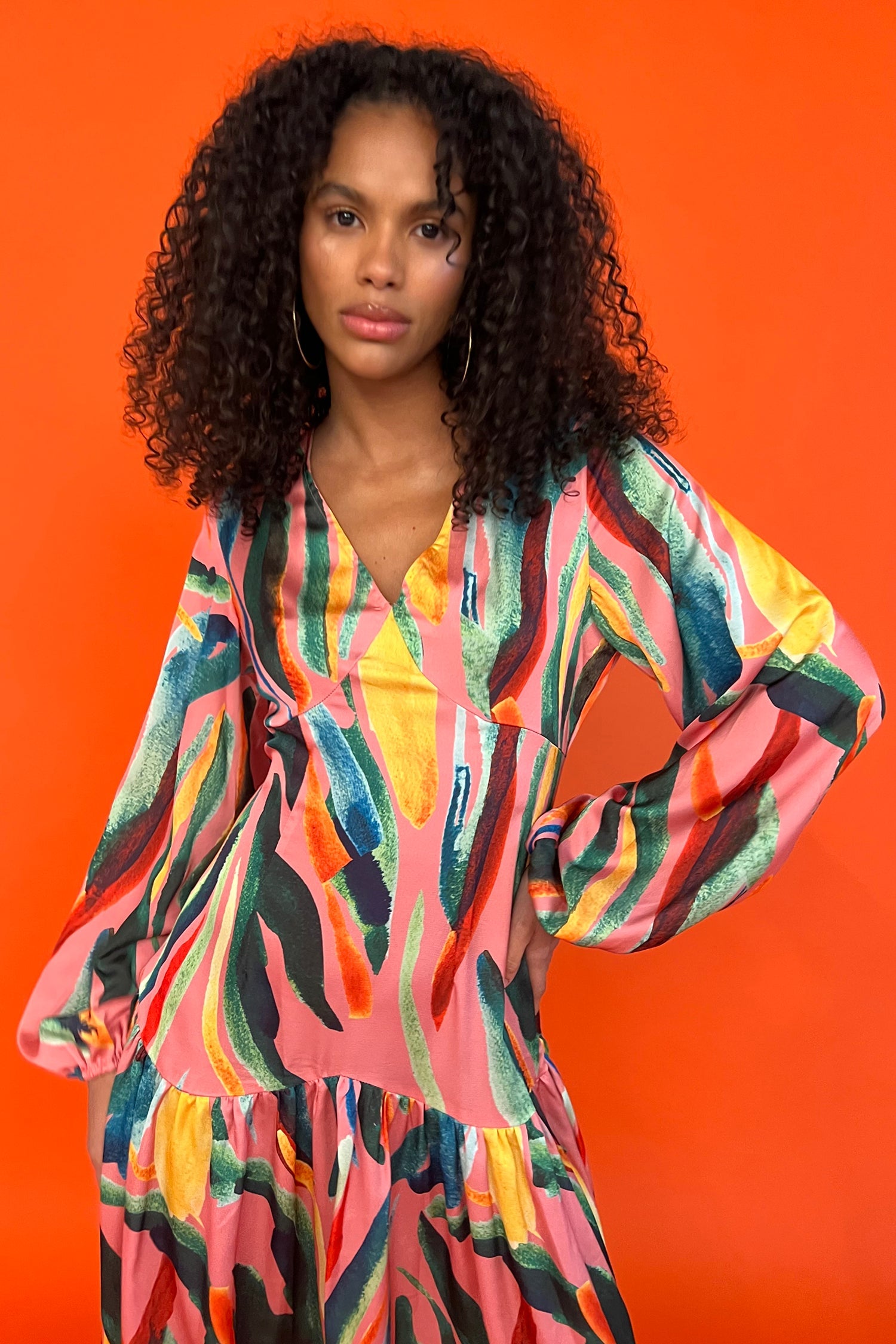 Model wearing Tropical Sophie Dress standing facing the camera