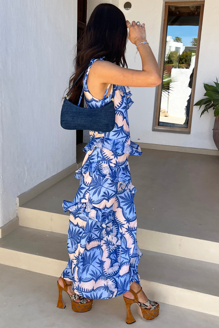 model looking away from the camera wearing the Blue Palm Faro Maxi Dress