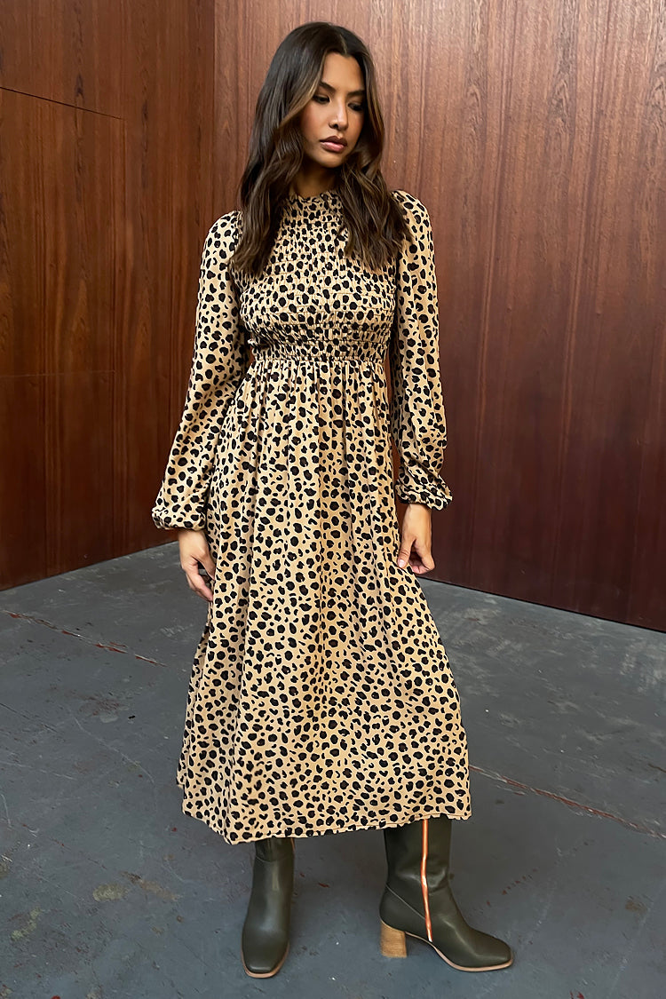 caption_Model wears Leopard Swedish Dress in UK 8 / US 4