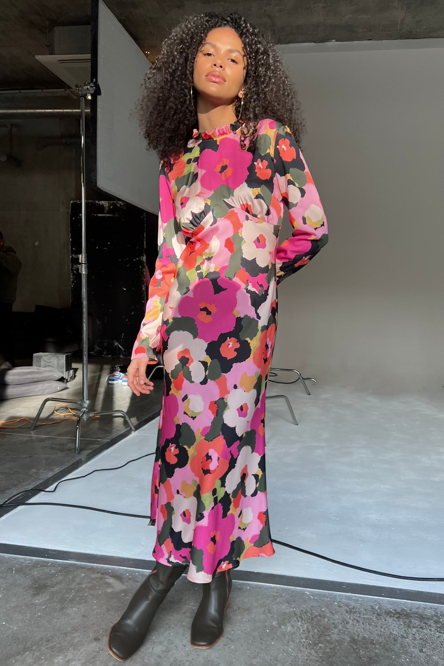 Model wearing Winter Blossom Beau Dress standing facing the camera