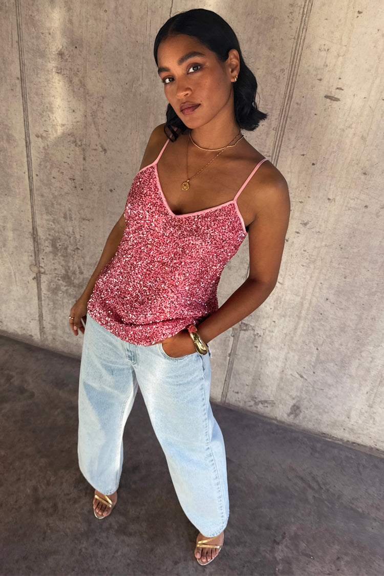 caption_Model wears Pink Sequin Cami Top in UK size 10/ US 6
