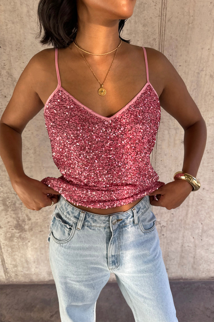 caption_Model wears Pink Sequin Cami Top in UK size 10/ US 6