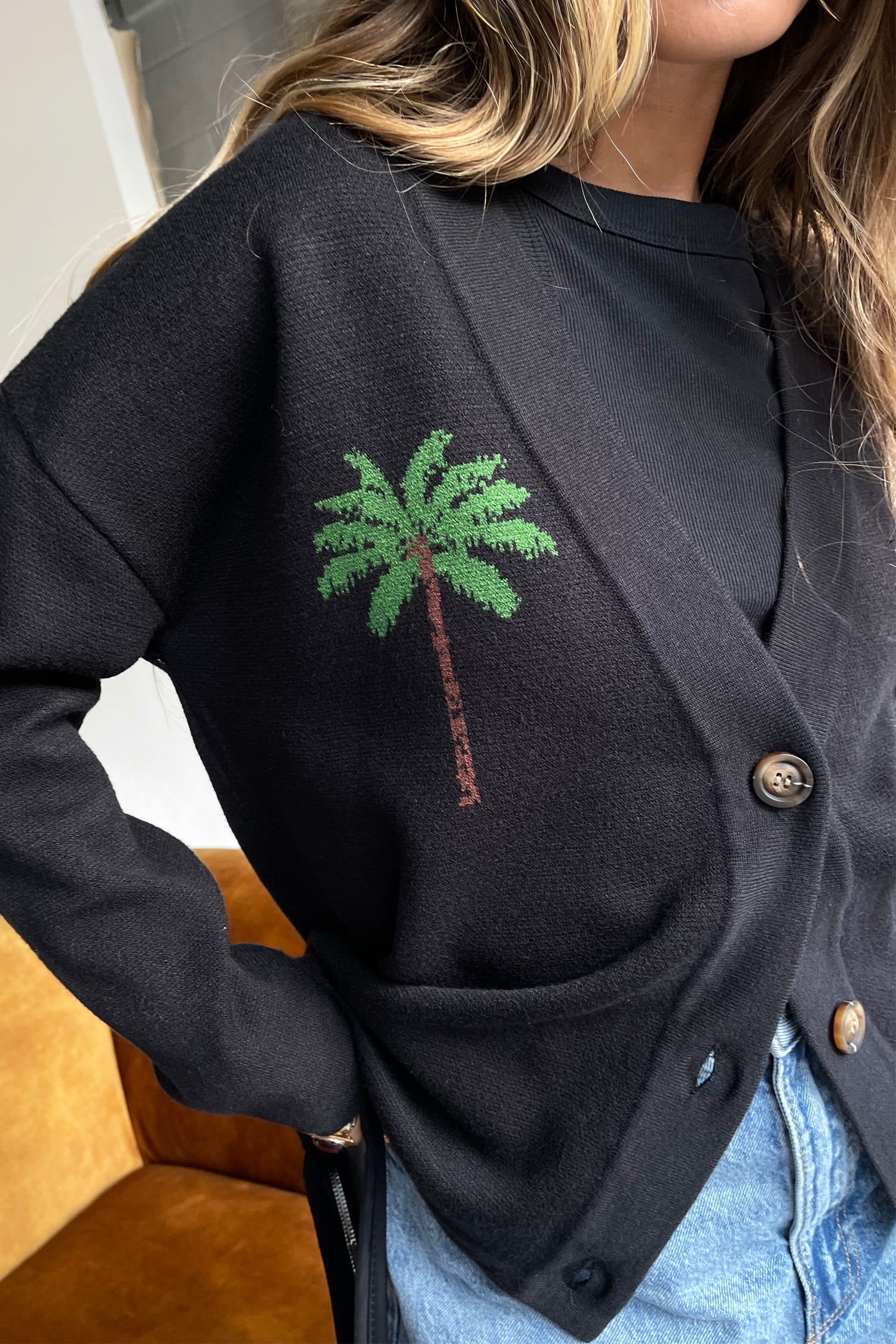 Model wearing Running Wild Cardigan facing the camera