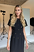 Model wearing Black Leah Dress standing facing the camera