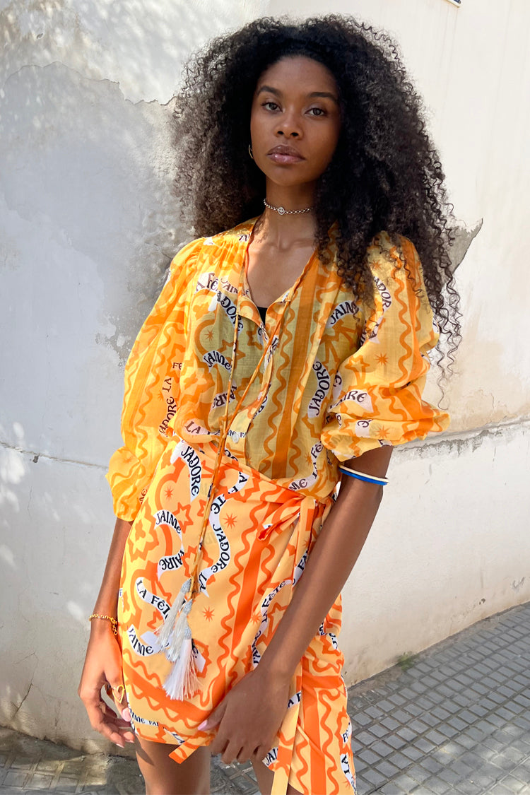 Model wearing Yellow J'adore Shirt