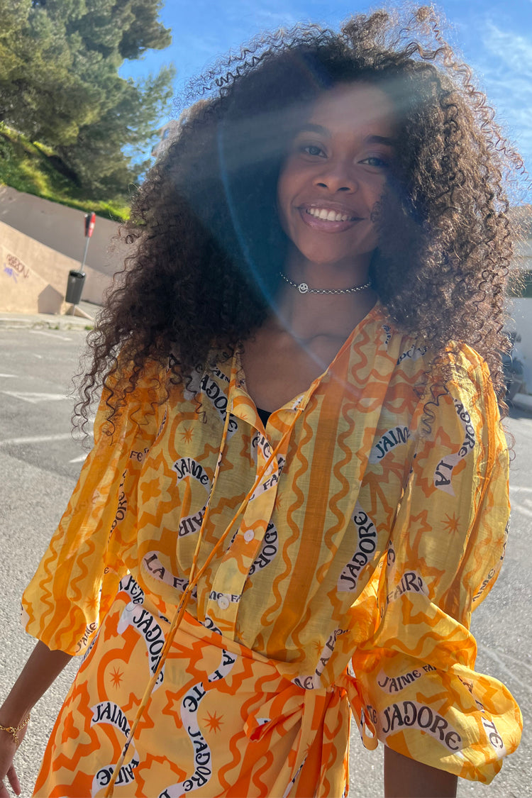 Model wearing Yellow J'adore Shirt