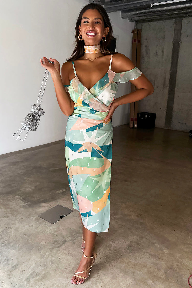 caption_Model wears Sage Lyra Jaspre Wrap Skirt in UK size 10/ US 6